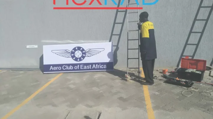 Light box sign installation in progress
