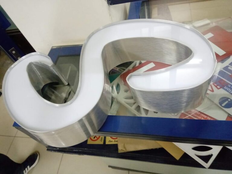 Brushed silver channelium 3D sign with front-lit acrylic faces by Flexrad